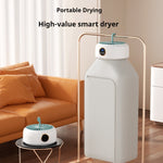 Foldable electric dryer for small garments, ideal for travel and small spaces.

