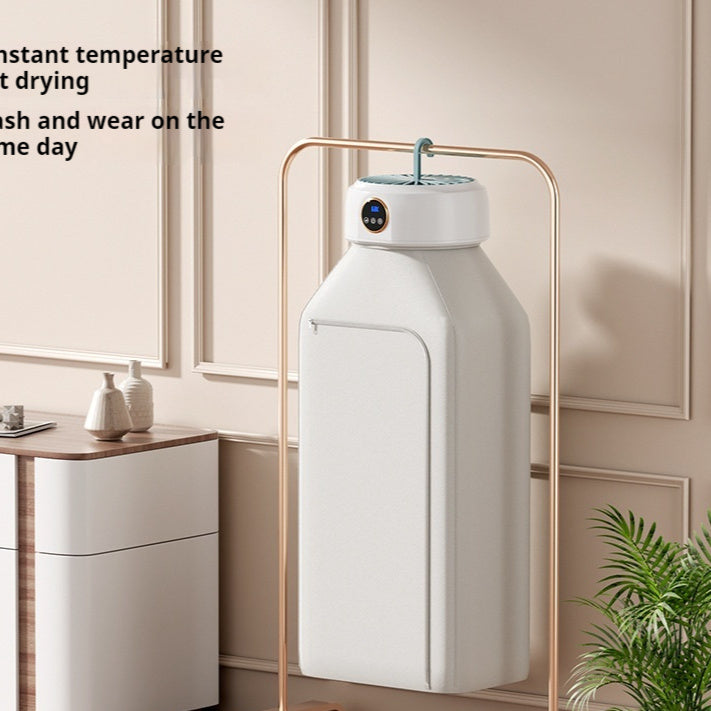 Foldable electric dryer for small garments, ideal for travel and small spaces.

