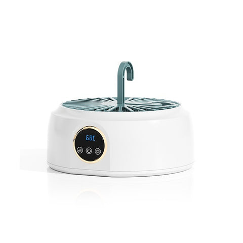 Foldable electric dryer for small garments, ideal for travel and small spaces.

